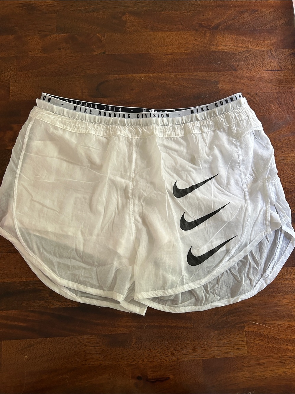 Nike White Women’s Athletic Shorts with Black Swoosh Trio